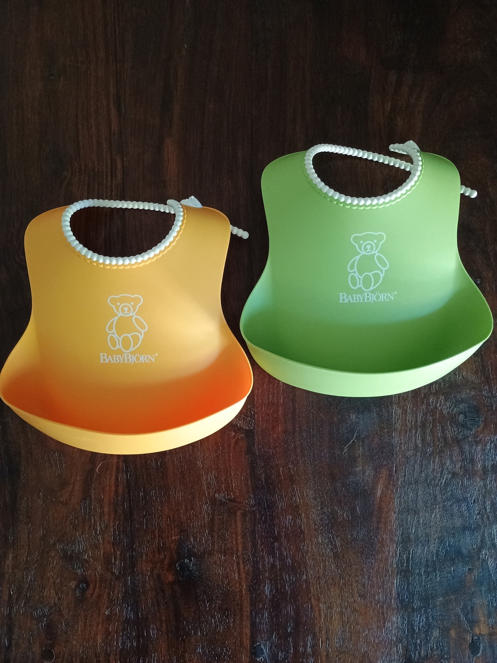 2 Baby Bjorn Bibs